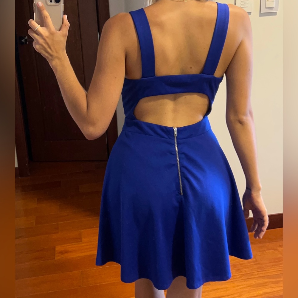 Blue dress open back with detail on the front.